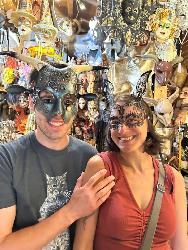 Visitor wearing a handmade mask in the Alice Masks atelier, Florence