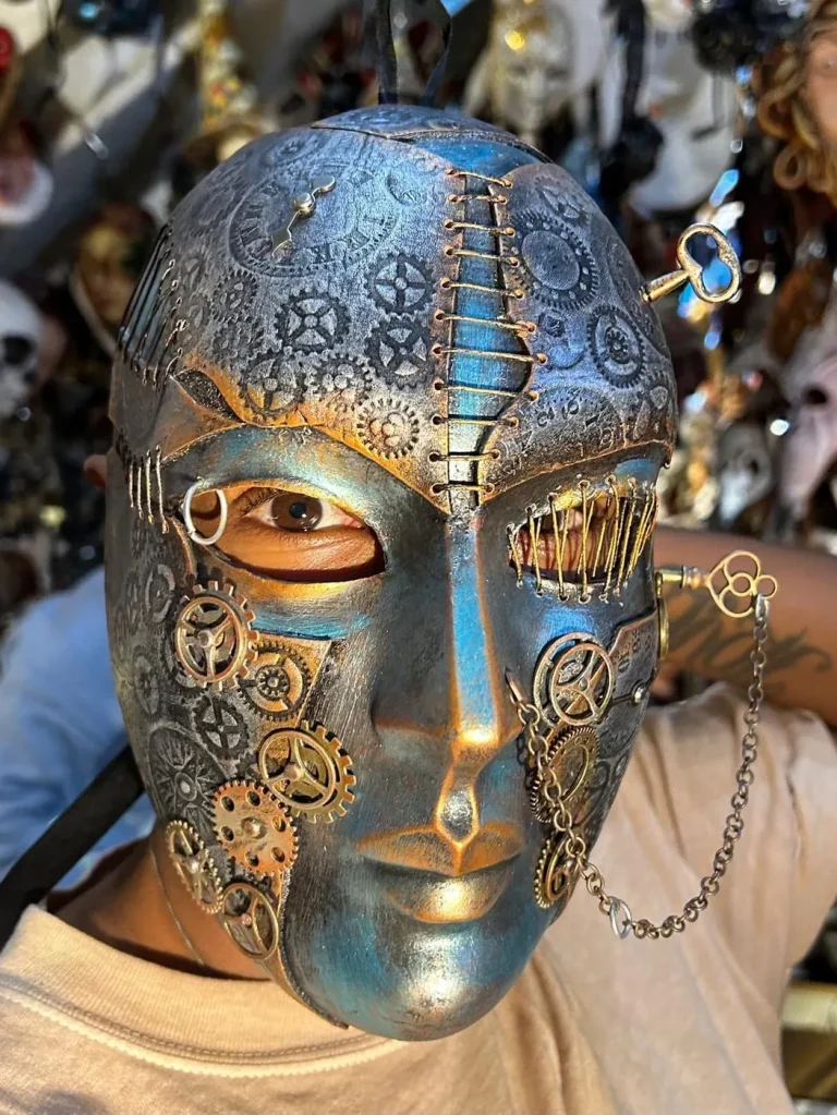 Visitor wearing a handmade mask in the Alice Masks atelier, Florence