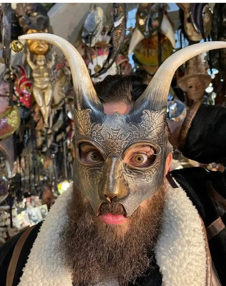 Visitor wearing a handmade mask in the Alice Masks atelier, Florence