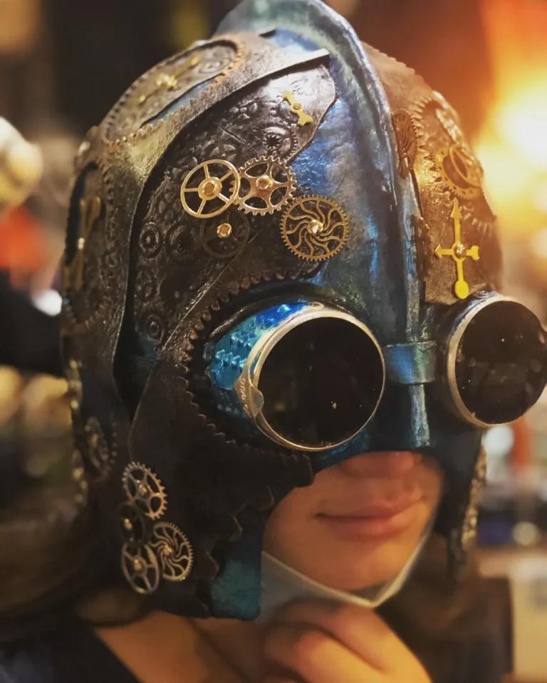 Visitor wearing a handmade mask in the Alice Masks atelier, Florence