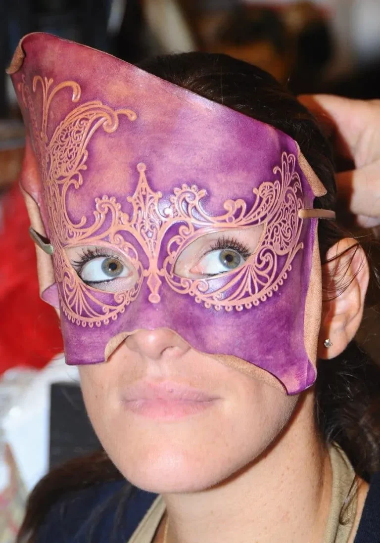 Visitor wearing a handmade mask in the Alice Masks atelier, Florence