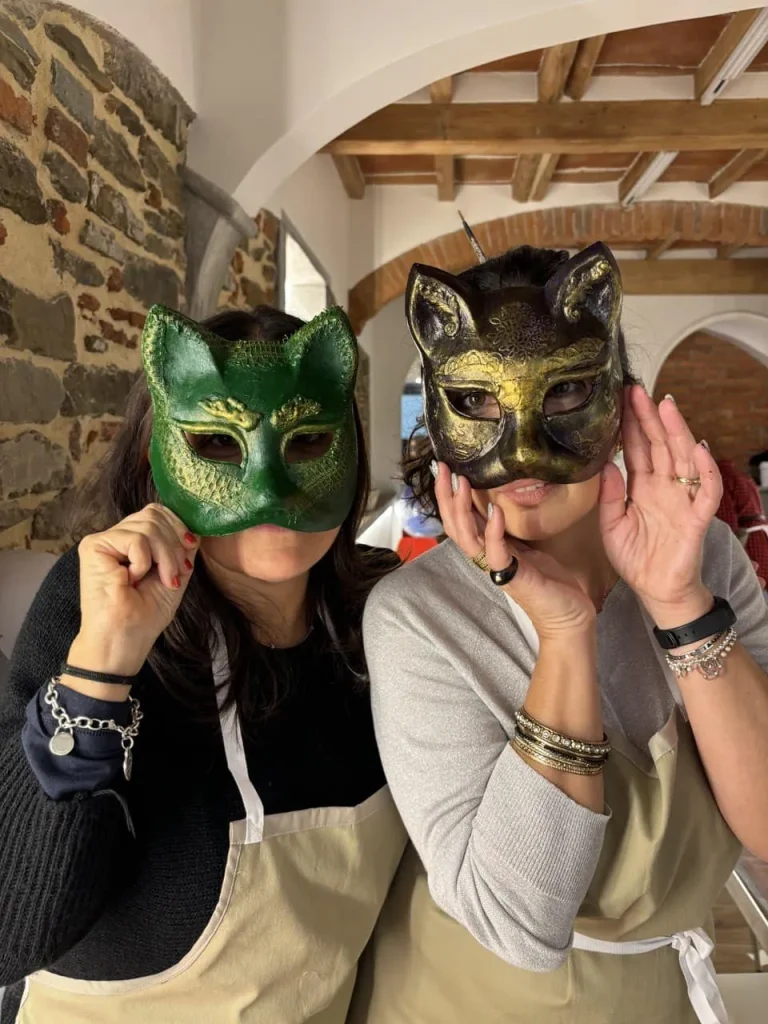 Visitor wearing a handmade mask in the Alice Masks atelier, Florence