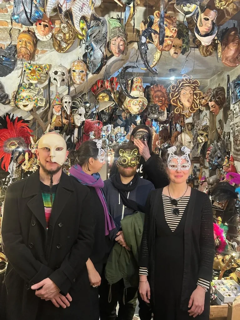 Visitor wearing a handmade mask in the Alice Masks atelier, Florence