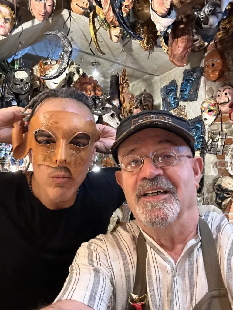Visitor wearing a handmade mask in the Alice Masks atelier, Florence