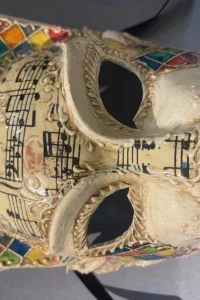 Harlequin cat mask sheet music alice masks florence Harlequin cat mask decorated with sheet music, handmade papier-mâché by Alice Masks, Florence